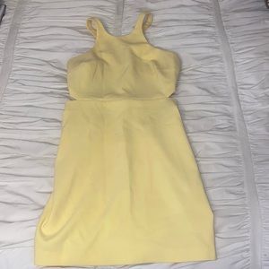 Likely brand yellow dress.